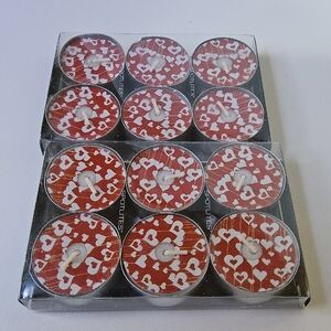12 heart candeles in the box